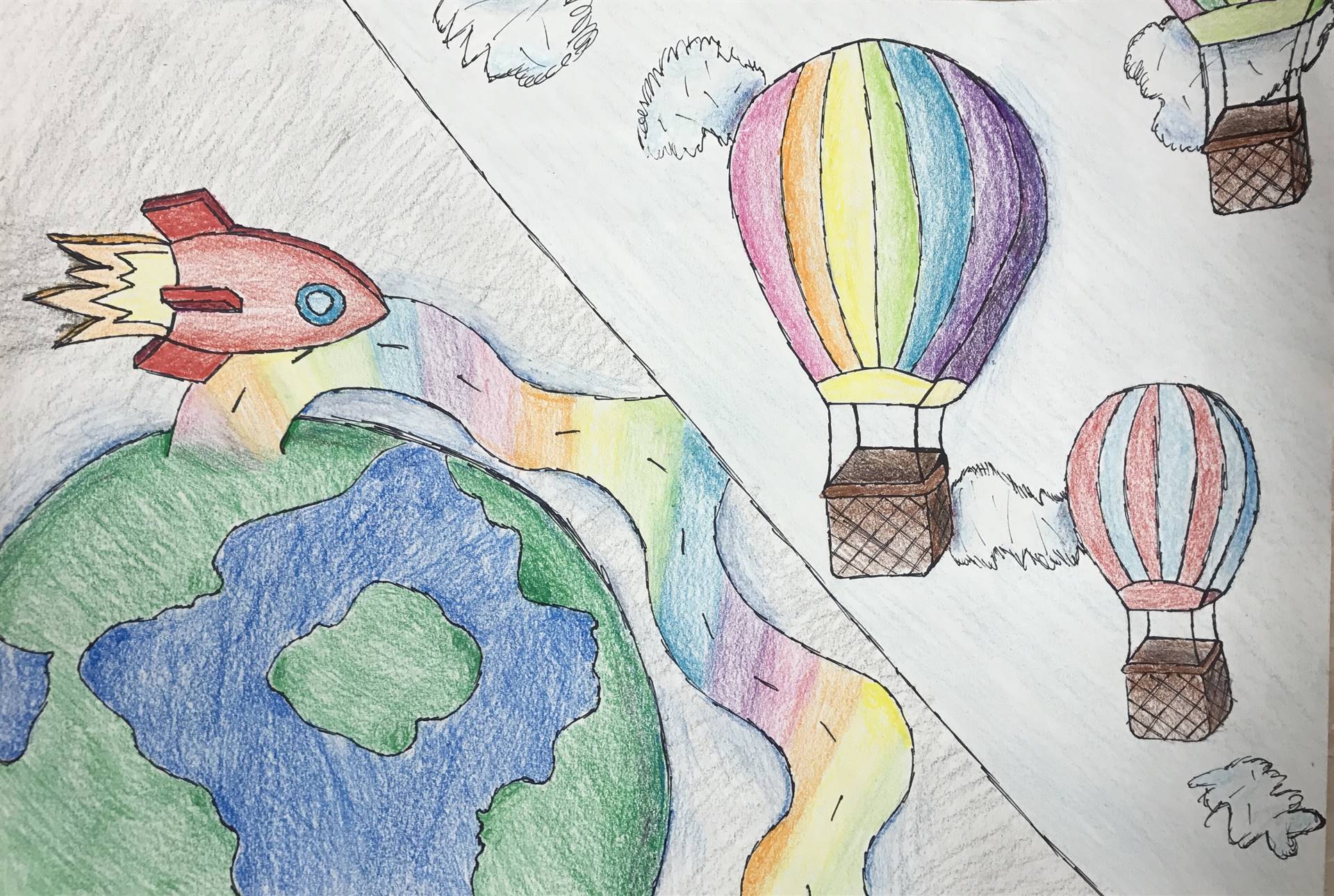 Student Art display of world and hot air balloons.