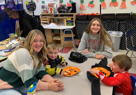 Teen Institute members working with elementary students