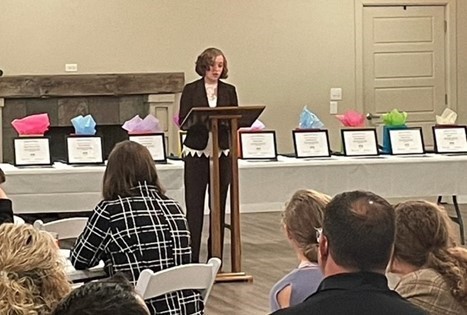 Student at podium at Coshocton County Youth Leadership Graduation Class of 2023.