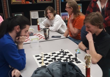 Students playing chess