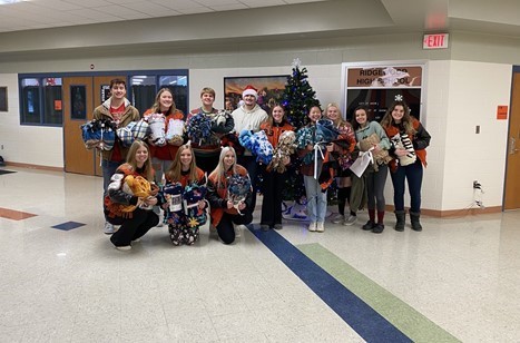 Teen Institute members getting ready to go to hospital to sing and distribute gifts.