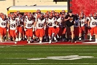 High School football entering stadium