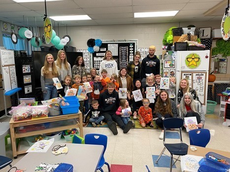 Group of Teen Institute students visiting  elementary students