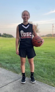 Girl holding a basketball